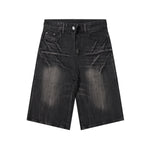 Bermudas vaqueras rasgadas con parches de camuflaje