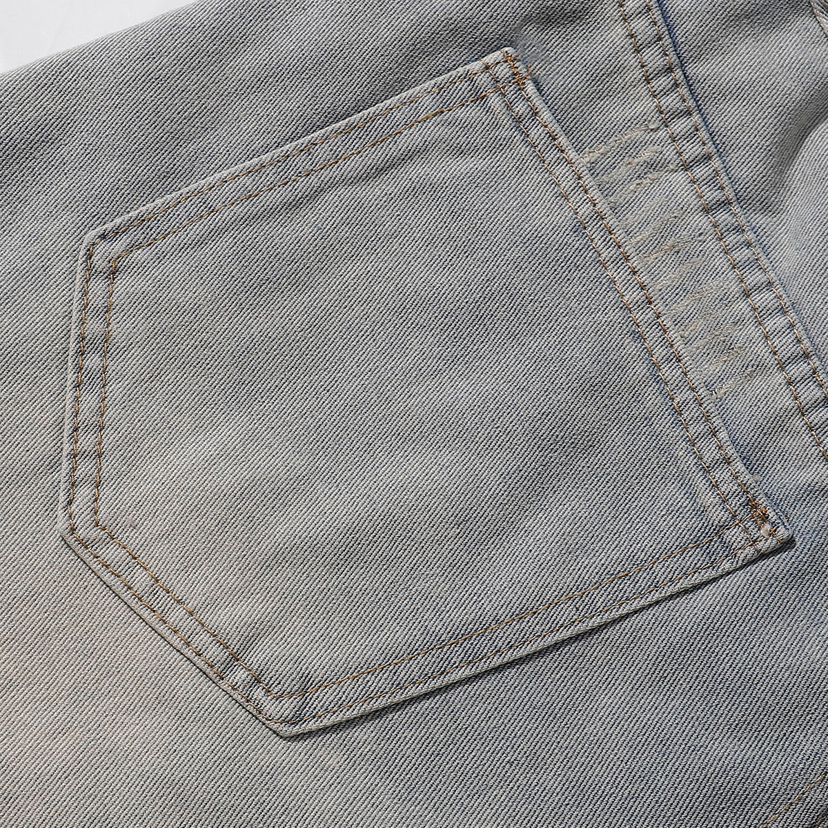 Bermudas vaqueras rasgadas con parches de camuflaje