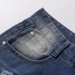 Bermudas vaqueras rasgadas con parches de camuflaje