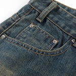 Bermudas vaqueras rasgadas con parches de camuflaje