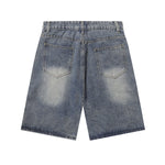 Bermudas vaqueras rasgadas con parches de camuflaje