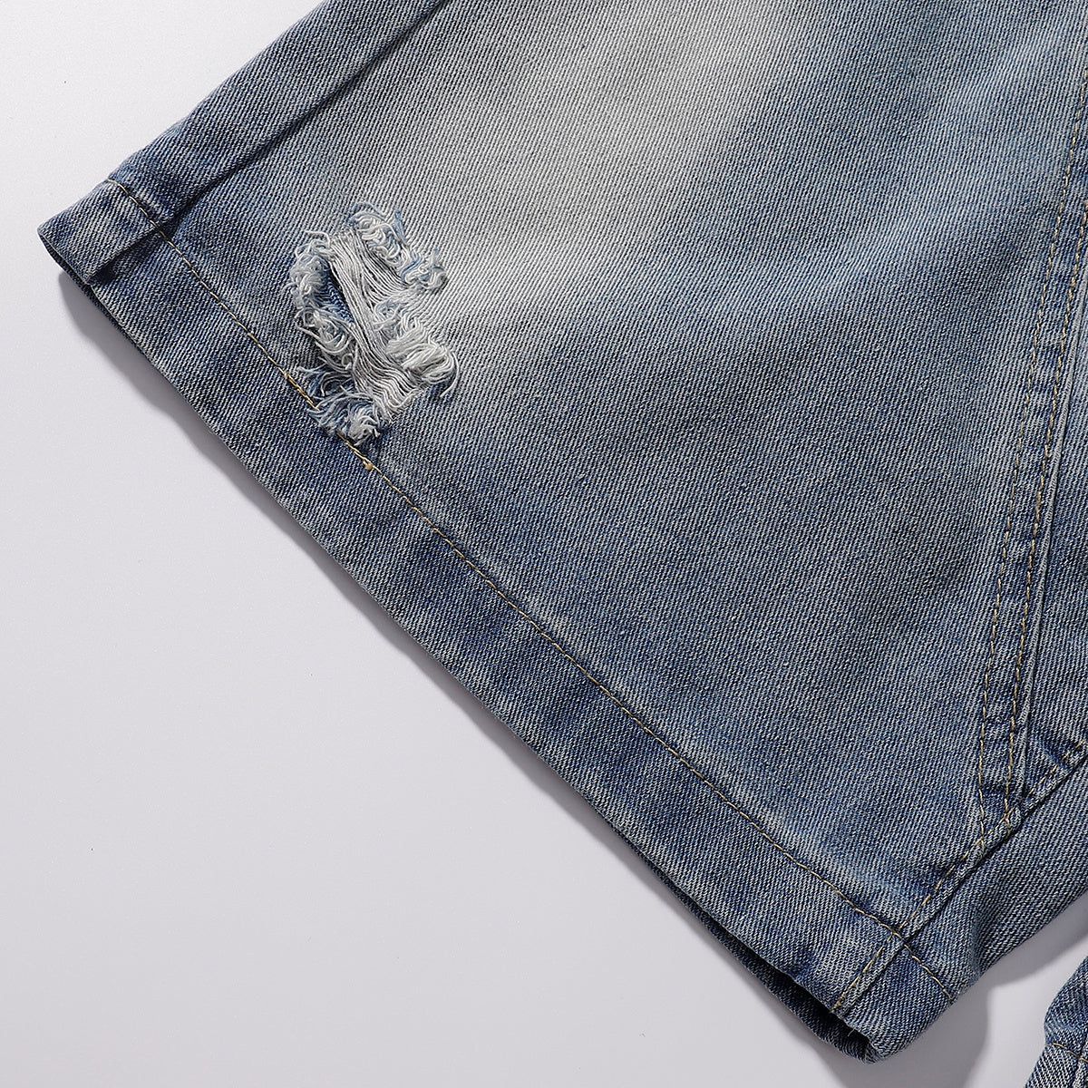 Bermudas vaqueras rasgadas con parches de camuflaje