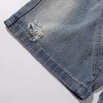 Bermudas vaqueras rasgadas con parches de camuflaje