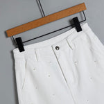 Pearl-Embellished Asymmetric Cut-Out Shorts