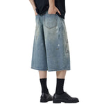 Paint-Splatter Bermuda Denim Shorts