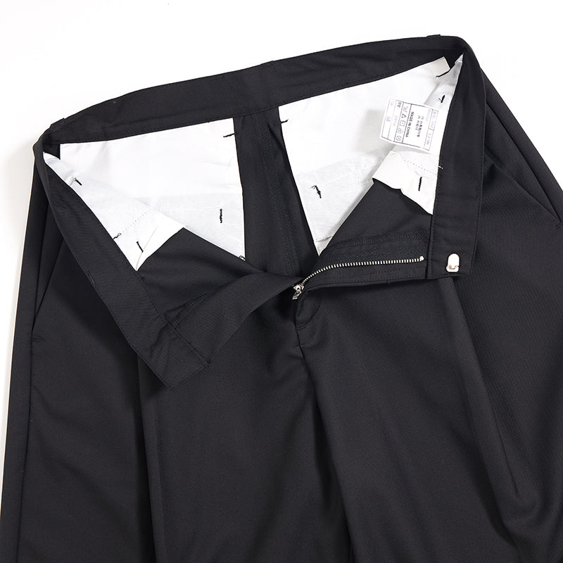 Pantalones anchos plisados