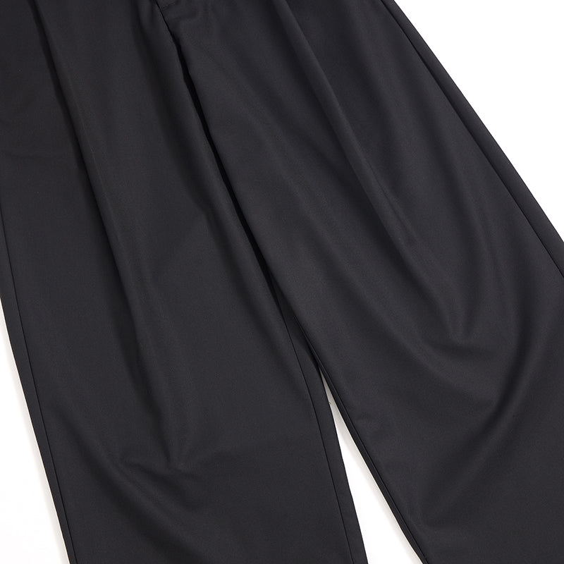 Pantalones anchos plisados