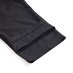 Pantalones anchos plisados