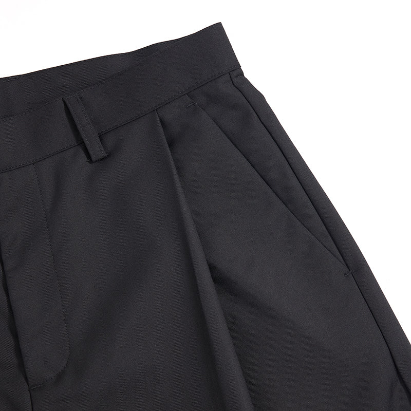 Pantalones anchos plisados