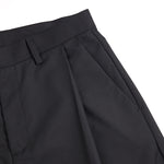 Pantalones anchos plisados