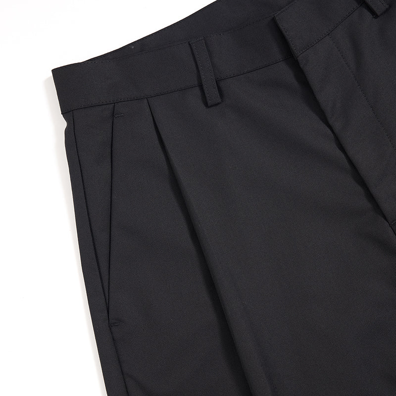 Pantalones anchos plisados