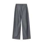 Pantalones anchos plisados