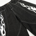 Bermudas vaqueras rasgadas con parches de camuflaje