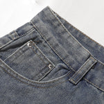 Bermudas vaqueras rasgadas con parches de camuflaje