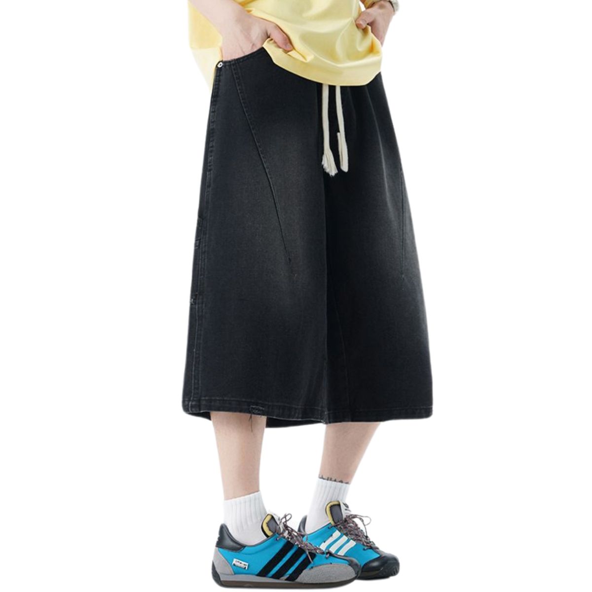 Pantalones vaqueros desgastados de pierna ancha y corte cropped