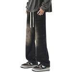 Vaqueros vintage lavados con cintura con cordón