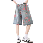 Bermudas vaqueras rasgadas con estampado floral