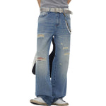 Vaqueros rectos rotos con dobladillo desgastado