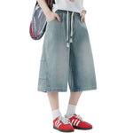 Pantalones vaqueros lavados de pierna ancha y corte cropped