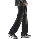 Vaqueros vintage lavados con cintura con cordón