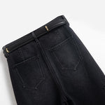 Vaqueros de cintura alta con aberturas y cuentas de perlas