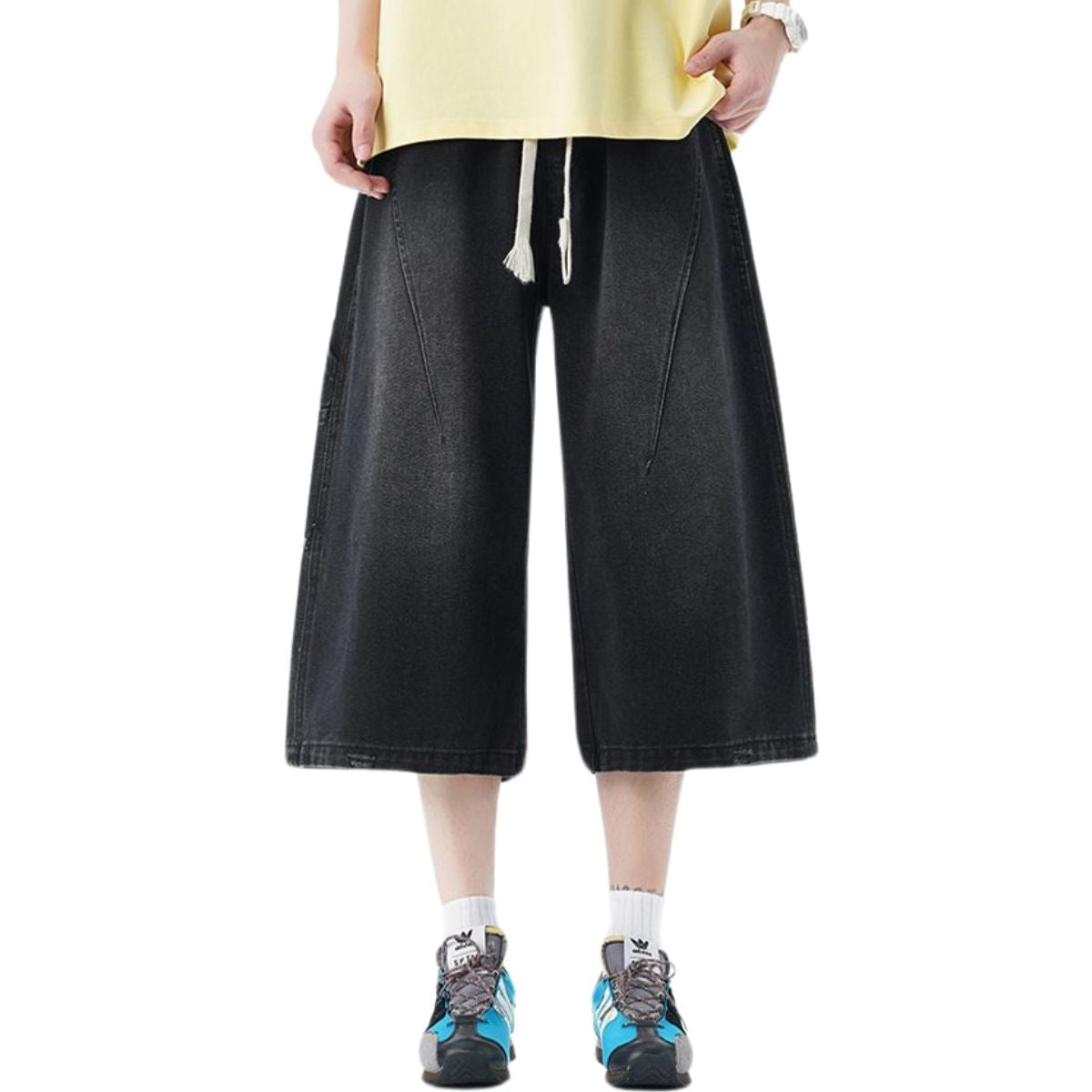 Pantalones vaqueros desgastados de pierna ancha y corte cropped