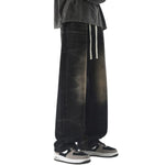 Vaqueros vintage lavados con cintura con cordón