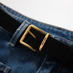 Vaqueros recortados con bordado floral y pedrería