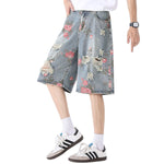 Bermudas vaqueras rasgadas con estampado floral