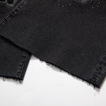 Vaqueros bordados con perlas y diamantes de imitación transferidos