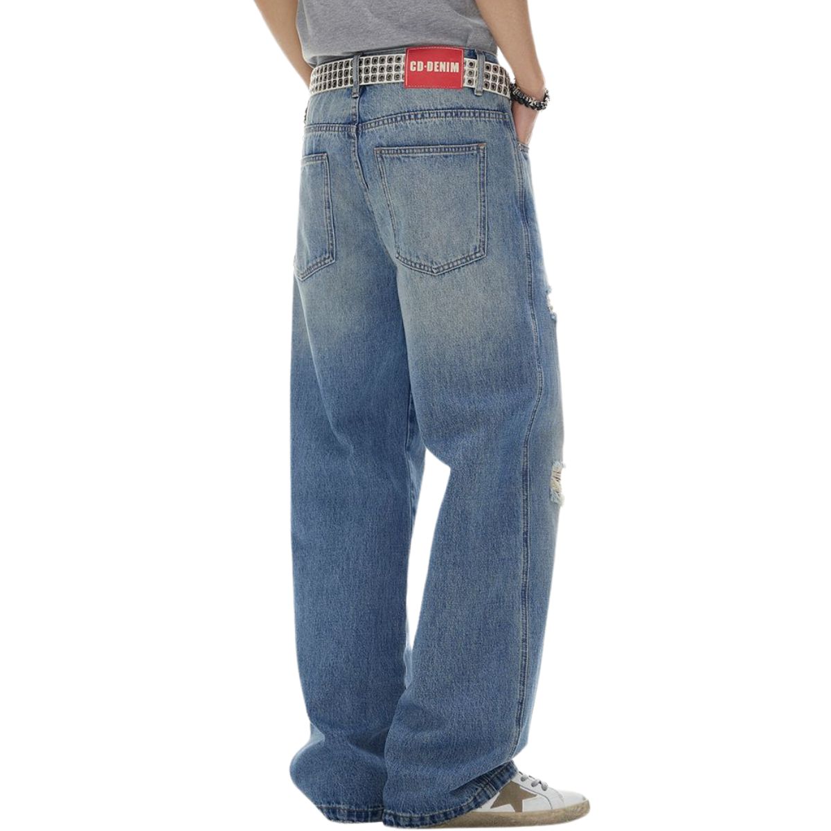 Vaqueros rectos rotos con dobladillo desgastado