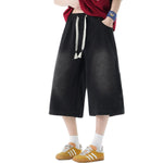 Pantalones vaqueros lavados de pierna ancha y corte cropped