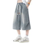 Pantalones vaqueros cortos lavados con cintura con cordón