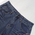 Bermudas vaqueras rasgadas con parches de camuflaje