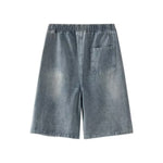 Bermudas vaqueras rasgadas con parches de camuflaje