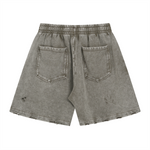 Pantalones cortos desgastados con lavado a la piedra