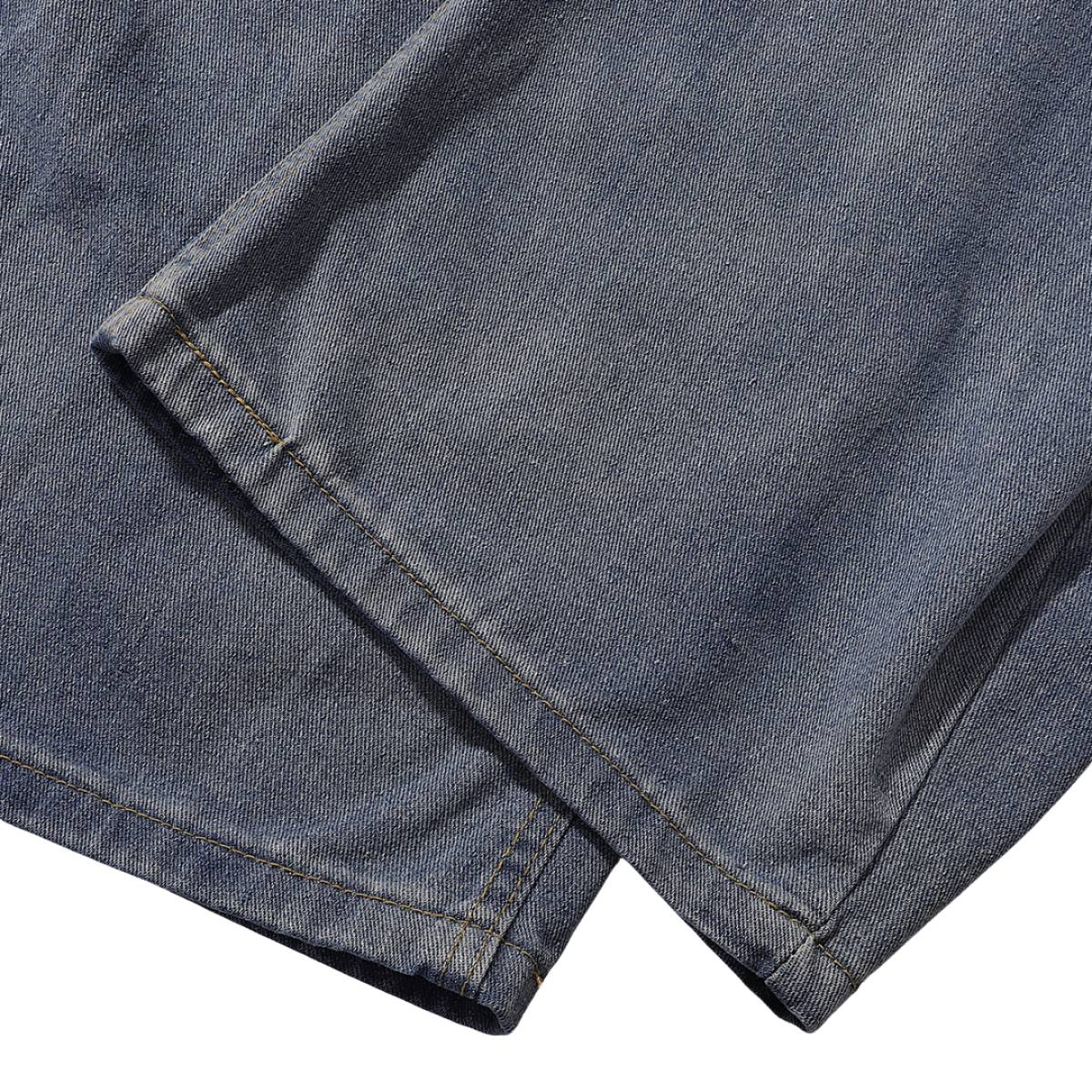 Vintage Washed Curved-Leg Denim Jeans