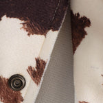 Vestido midi vaquero sin mangas con botones y aberturas en la parte delantera