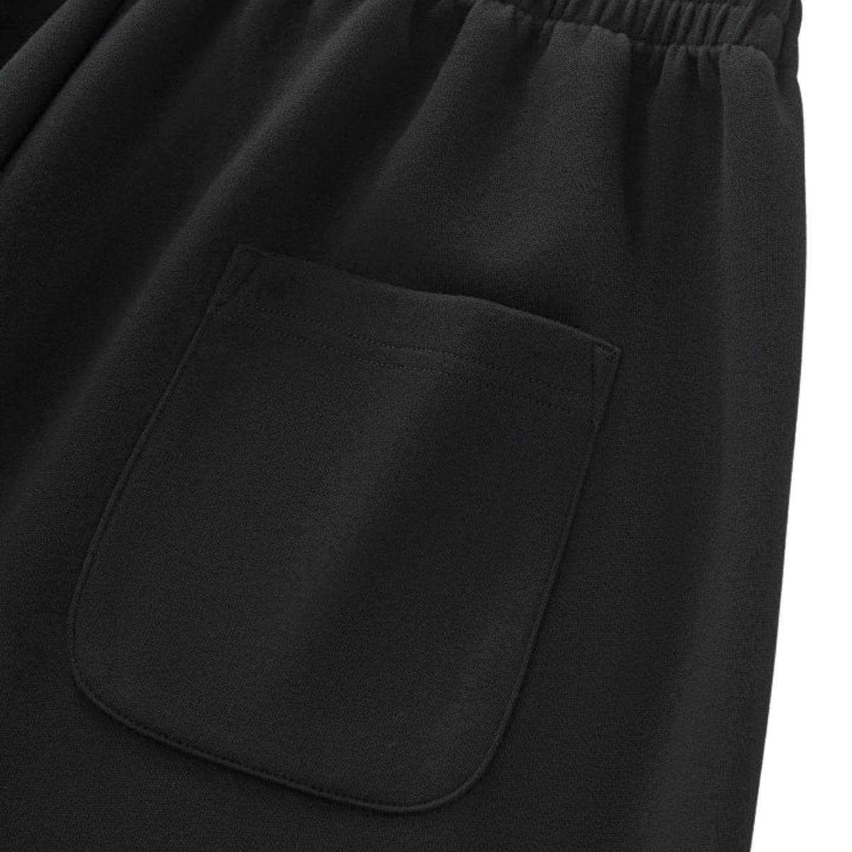 Pantalones deportivos holgados de color gris oscuro