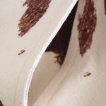 Vestido midi vaquero sin mangas con botones y aberturas en la parte delantera