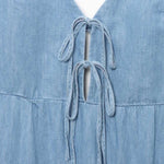 Falda vaquera con bordado de perlas y lavado vintage