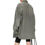 Vestido midi vaquero sin mangas con botones y aberturas en la parte delantera