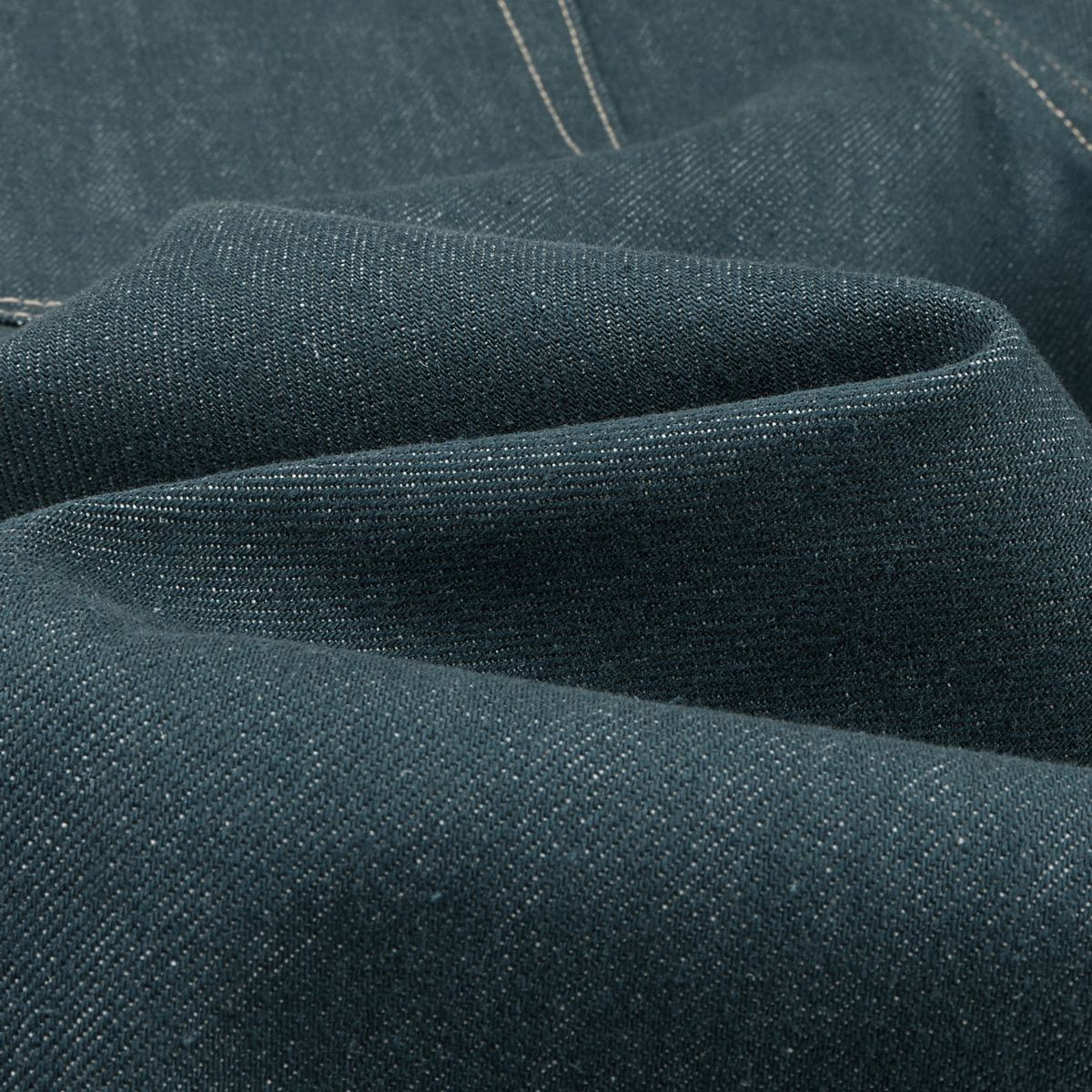 Raw Denim Jeans with Teal Multi‑Button Fly Design