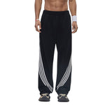 Pantalones deportivos holgados de color gris oscuro