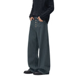 Raw Denim Jeans with Teal Multi‑Button Fly Design