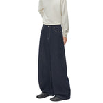 Star‑Print Curved Blade Raw Denim Jeans
