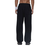 Pantalones deportivos holgados de color gris oscuro