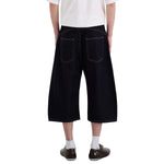 Bermudas con lavado vintage y salpicaduras de tinta