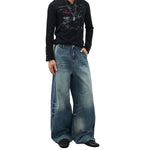 Vintage Blue Wide‑Leg Jeans With Side Pleat Details