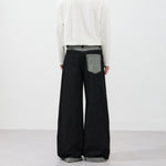 Washed Color‑Block Patchwork Jeans